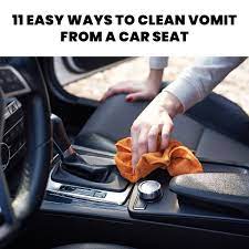 to clean vomit from a car seat