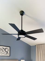 a ceiling fan to two wall switches