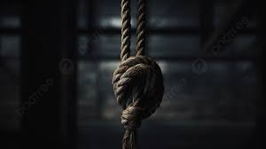 rope hanging in the dark at a factory