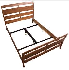 wood bed center support system