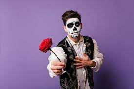 mexican dead makeup holding