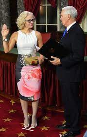 Kyrsten Sinema is 'Senator Madonna' because of her dress? Get over it