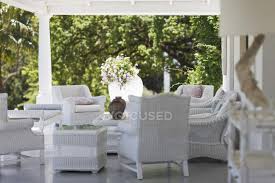 white wicker furniture on luxury patio