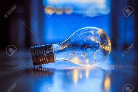 Led Light Bulb Is Lying On The Wooden Floor Symbol For Ideas