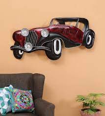 wrought iron vintage car in red