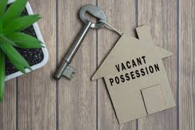 Vacant possession text on house model and key on wooden desk 7315859 Stock  Photo at Vecteezy