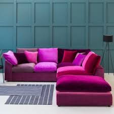 multi coloured sofas beds and chairs