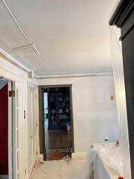 paint coats to cover textured ceiling