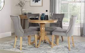 Alternatively, browse all our dining room furniture, or individual oak dining tables. Kingston Round Oak Dining Table With 4 Bewley Grey Velvet Chairs Furniture And Choice