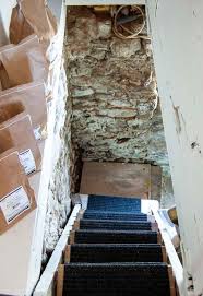 Storage Space Into Your Basement Stairs
