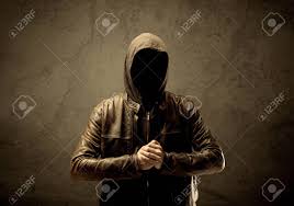 A Suspicious Faceless Mature Male In Dark Urban Environment And Light In  Front Of A Concrete Empty Wall Background Stock Photo, Picture And Royalty  Free Image. Image 82744950.