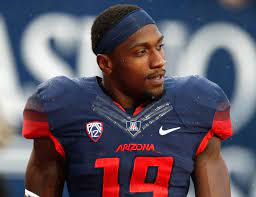 Arizona football player charged with murder