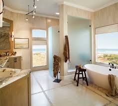 Also, notice the beautifully curved balcony. 20 Luxurious Bathrooms With A Scenic View Of The Ocean