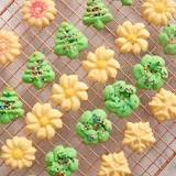 Do I decorate spritz cookies before or after baking?