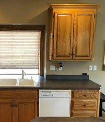 When i started making updates to the kitchen, i wasn't sure what i wanted in terms of the style or overall look, but kyler was adamant that we not repaint the cabinets. Tips And Ideas How To Update Oak Or Wood Cabinets Paint Stain And More