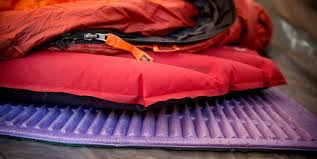 What do you put under a sleeping pad?