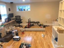 Laminate planks are an excellent option for a temporary floor, as they too can be installed (floated) over carpet using the same installation process as vinyl planks. Awesome Diy Home Gym Exercise Room Office On A Budget Lehman Lane