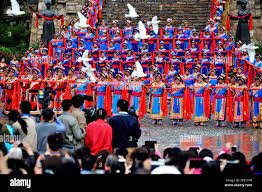 People of the Qiang ethnic group celebrate Wari'ezu Festival during the  gate opening ceremony at the ancient Qiang castle in Maoxian County in  southwest China's Sichuan Province, June 20, 2015. More than