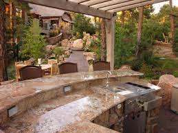 Designs including wood pallets, cinder blocks, and cement, we have something for all spaces and budgets. Outdoor Kitchen Island Grills Pictures Ideas From Hgtv Hgtv
