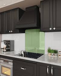 Typically used on floors, penny tiles introduce vintage charm and texture to this kitchen's backsplash. Stove Glass Backsplash Solid Colors Free Shipping