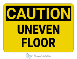 printable uneven floor caution sign