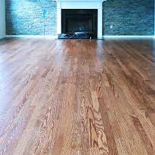 Old worn white oak floors get a makover with provincial stain to achieve a warm medium toned brown. Hardwood Flooring Photos Project Gallery Rochester Ny
