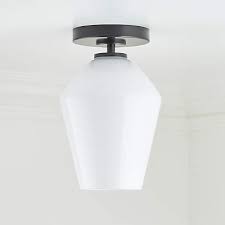 arren black flush mount light with milk