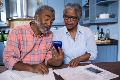 Retirees Evaluating Long-Term Household Financial Planning, AI generated