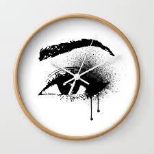 eye makeup with paint drips wall clock