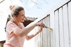 Painting a fence: how to prepare and paint a wooden fence like a pro | Real  Homes