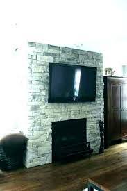 uneven stone fireplace tv mounting