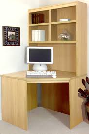 A pentagonal curved desktop rests on 2 open front shelving units and 2 posts. Ebern Designs Fiona Corner Computer Desk Reviews Wayfair Co Uk