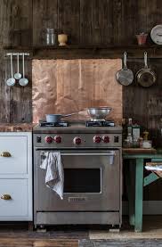 These pictures of this page are about:distressed copper sheet backsplash. Kitchen Backsplash Ideas Go Metallic Apartment Therapy