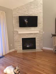 Corner Fireplace And A Wall Mounted Tv