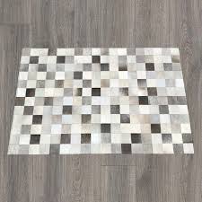 mixed gray patchwork cowhide rug