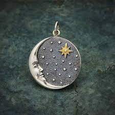 silver crescent moon face pendant with