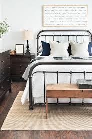 bedrooms with black iron beds