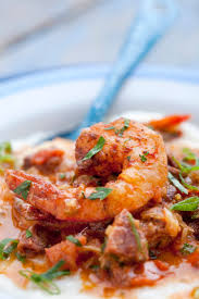 smothered shrimp and andouille over