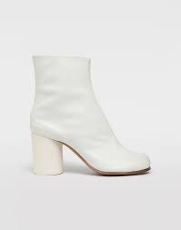 With the brand's logo stamped in white stitch at the heel, the boots get their 'airbag' name from the transparent and black. Maison Margiela Tabi Calfskin Boots Women Maison Margiela Store
