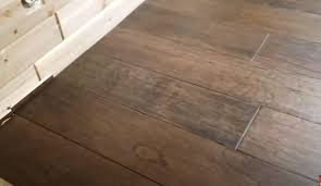 install hardwood flooring over tile