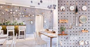 A Concrete Pegboard Lines The Wall Of