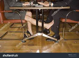 Businesspeople Playing Footsie Under Table Stock Photo 217359673 |  Shutterstock