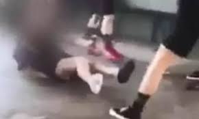 Shocking moment high school girls stomp on a student's head - with one  pulling out a SCREWDRIVER | Daily Mail Online