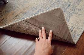 how to flatten curling rug corners