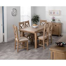 The living room in this image, however, shows you can place two different seating types. Cotswold Oak Medium Dining Table Set With 6 Cross Back Chairs Buy Online At Qd Stores