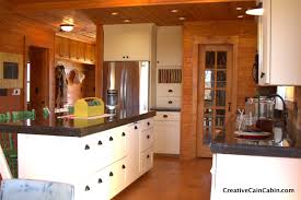 white kitchen in a log home creative