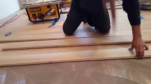 gluing wood floors to concrete you
