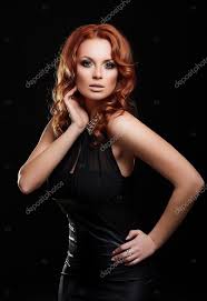 y redhead stylish woman in black