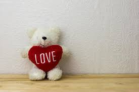 lovely teddy bear and red shape