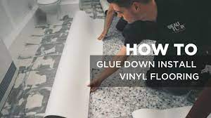 glue and install vinyl sheet flooring